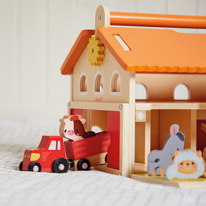 Drewniana farma z otwieranym dachem i figurkami Janod