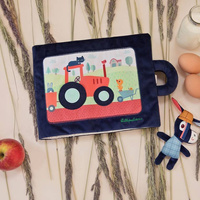 Materiałowa edukacyjna książeczka z mini przytulanką Osiołek Ignace Lilliputiens