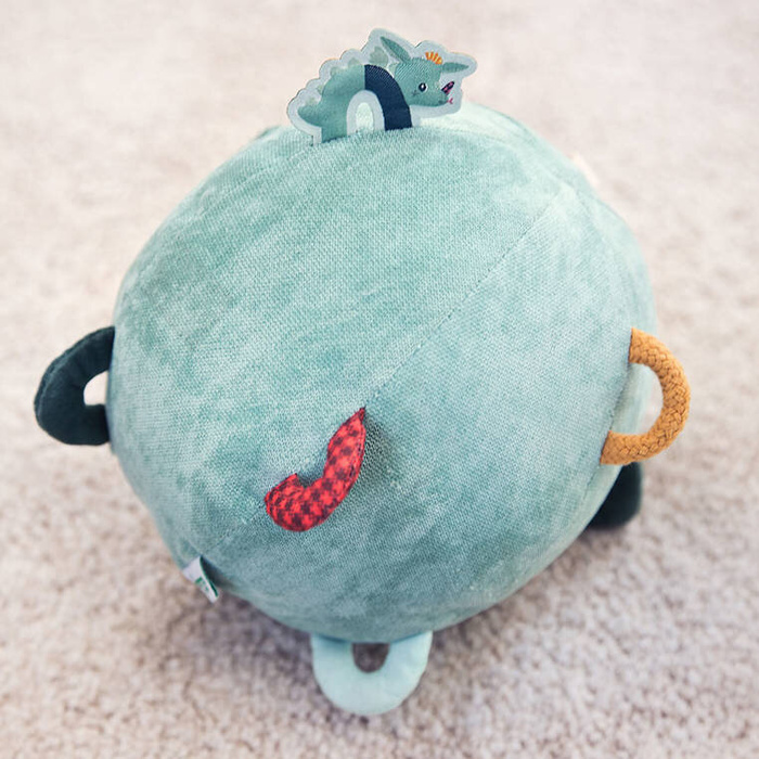 Pluszowa piłka sensoryczna z pozytywką wielofunkcyjna Smok Joe Lilliputiens