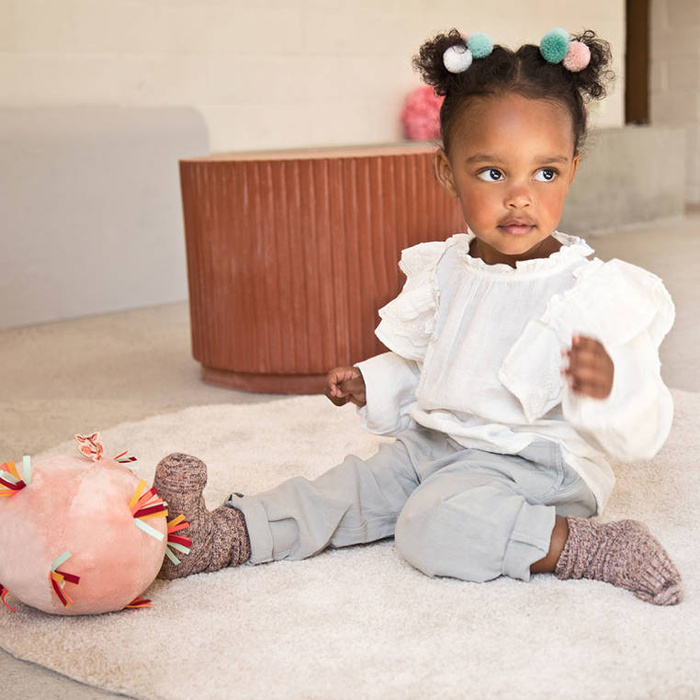 Pluszowa piłka sensoryczna z pozytywką wielofunkcyjna Sarenka Stella Lilliputiens