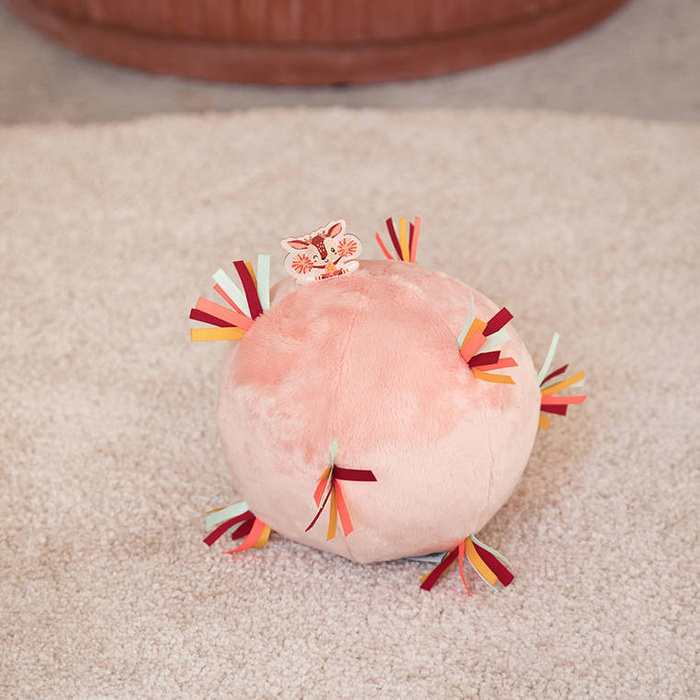 Pluszowa piłka sensoryczna z pozytywką wielofunkcyjna Sarenka Stella Lilliputiens