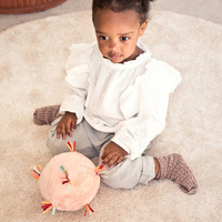 Pluszowa piłka sensoryczna z pozytywką wielofunkcyjna Sarenka Stella Lilliputiens